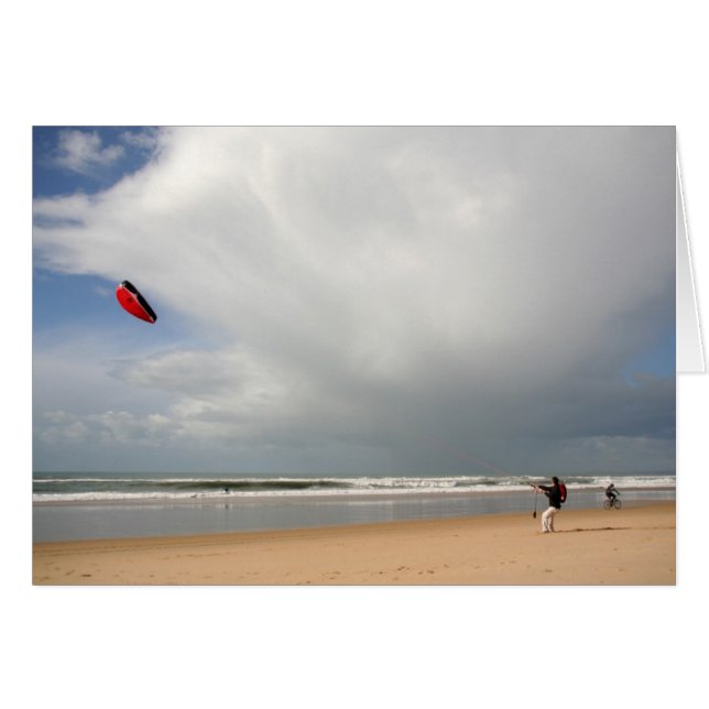 Niño en la playa kitesurf (Anverso (Horizontal))