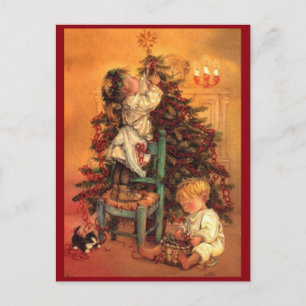 Niños de Navidad Vintage decorando el árbol