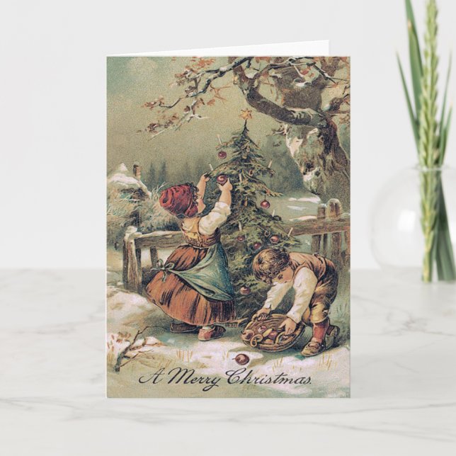 Niños decorando árbol de Navidad nevado (Anverso)