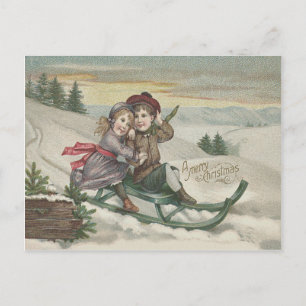 Niños en trineo árbol de Navidad nieve invierno