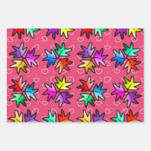 Niños envolviendo papel de hojas de corazón 