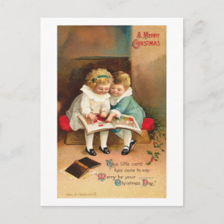 Niños leyendo la tarjeta de Navidades de libros