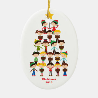Niños que cantan el ornamento del navidad de los