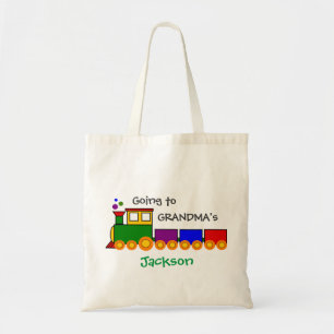 Niños yendo a la abuela a la bolsa de la noche co