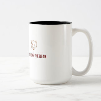 No empuje la taza del café/del té del oso