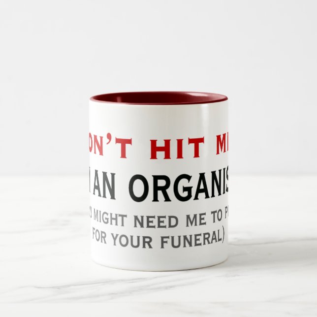No golpee una taza del organista (Centro)