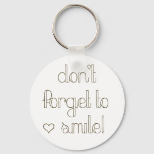 No olvide sonreír llavero