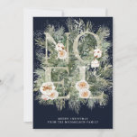 Noel Winter Pine Botánica Tarjeta de Navidades de<br><div class="desc">La noel está escrita en letras purpurinas plateadas adornadas con flores blancas. Están enclavadas en ramas de pino invernal que están salpicadas de nieve. A continuación se muestran dos líneas de texto blanco que permiten personalizar el mensaje. El fondo azul oscuro los hace realmente pop.</div>