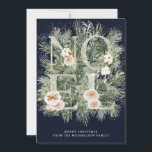 Noel Winter Pine Botánica Tarjeta de Navidades de<br><div class="desc">La noel está escrita en letras purpurinas plateadas adornadas con flores blancas. Están enclavadas en ramas de pino invernal que están salpicadas de nieve. A continuación se muestran dos líneas de texto blanco que permiten personalizar el mensaje. El fondo azul oscuro los hace realmente pop.</div>