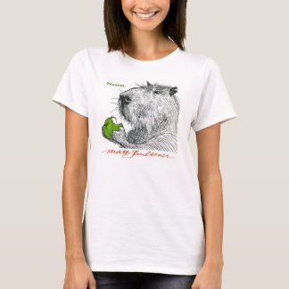 "Nom." La camiseta de la mujer del Capybara