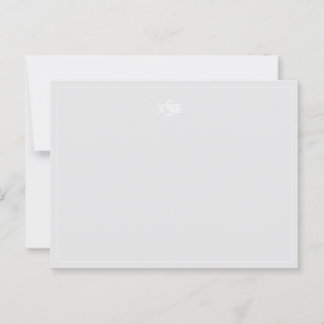Nota monogramada de gris claro y blanco