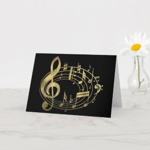 Notas musicales doradas de forma ovalada