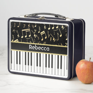 Notas musicales y claves de piano negro y oro