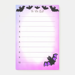 Notas Post-it® Bates voladores de Halloween en la lista de tareas