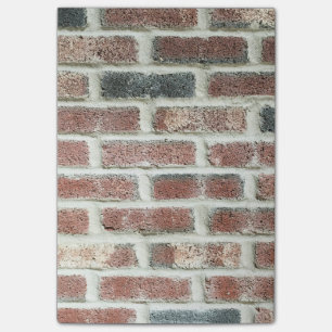 Notas Post-it® Textura gris del ladrillo del fondo de la pared de