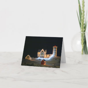 Nubble Light en una noche nevada.