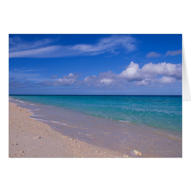 Nube en cielo azul sobre una playa de arena (Anverso (Horizontal))