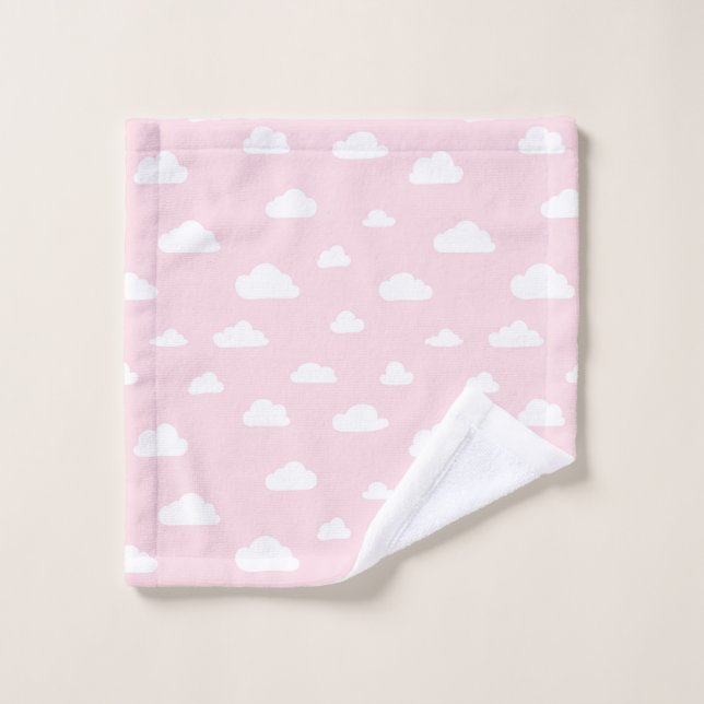 Nubes blancas del dibujo animado en modelo rosado