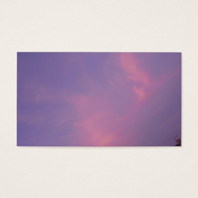 Nubes naranjas en el cielo azul al amanecer (Frente)