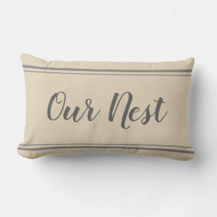 Nuestro nido almohada gris y beige