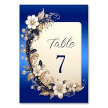 Número de mesa con adorno floral blanco azulado