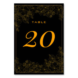 Número de mesa con patrón dorado sutil y negro ele