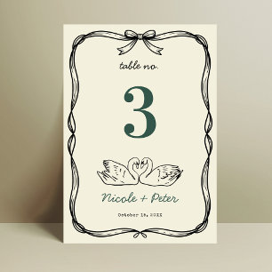 Número de mesa de boda con letra manuscrita y cisn