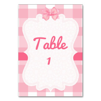 Número de mesa de cuadros rosados con lazo