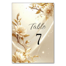 Número de mesa de flores blancas y doradas