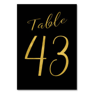 Número de mesa elegante negro con brillo dorado de
