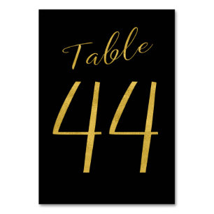 Número de mesa elegante negro con brillo dorado de