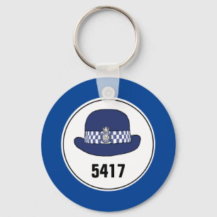 Número de placa. Mujer policía WPC. Llavero