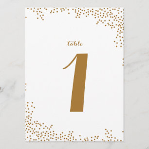 Números de mesa de boda con confeti dorado
