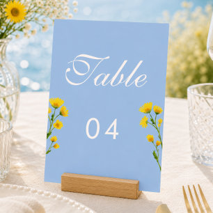 Números de mesa de boda de ranúnculo azul y amaril