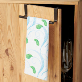 Ondas azules y toalla de cocina de hojas verdes