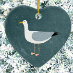Ornamento cerámico de gaviota cuta<br><div class="desc">Una gaviota descarada frente al océano profundo y verde. Ideal para los amantes de los pájaros suaves y de la costa. Arte original de Nic Squirrell.</div>