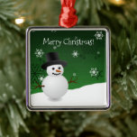 Ornamento cerámico de la escena de invierno verde<br><div class="desc">Añada un toque caprichoso a su árbol de Navidad esta temporada navideña con un adorno de cerámica de la escena de invierno verde Snowman. El diseño ornamental incluye un muñeco de nieve feliz en una escena invernal con un fondo verde adornado con copos de nieve a color. También hay artículos...</div>