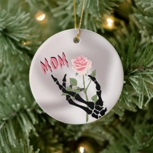 Ornamento cerámico floral de mano de calavera