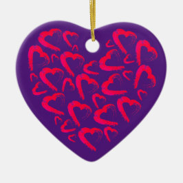 Ornamento cerámico morado del corazón rojo