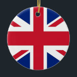 Ornamento con pabellón del Reino Unido<br><div class="desc">Iluminar su temporada de vacaciones con orgullo británico usando nuestro adorno navideño festivo con Union Jack! Infunde su decoración de vacaciones con el espíritu del Reino Unido con nuestro adorno cuidadosamente diseñado, adornado con el icónico diseño de la bandera Union Jack. Los audaces colores rojo, blanco y azul, dispuestos en...</div>