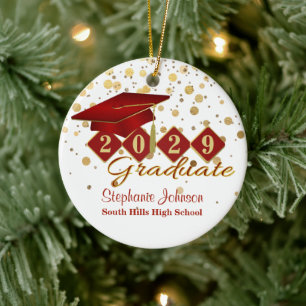 Ornamento de cerámica de oro y rojo de graduación