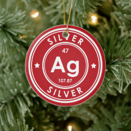 Ornamento de cerámica roja de elemento plateado