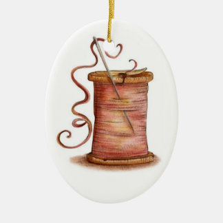 ornamento de la aguja y del hilo