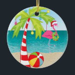 Ornamento de Navidad Tropical Beach Flamingo Palm<br><div class="desc">Ornamento de Navidad Flamingo Palm Tree en Playa Tropical. ¡Trae un toque de paraíso tropical a tu árbol de Navidad con este maravilloso adorno! Un flamenco lúdico, con un sombrero de Santa, se adentra en aguas cristalinas del océano, mientras que una palmera cercana se mueve suavemente en la brisa. Esta...</div>