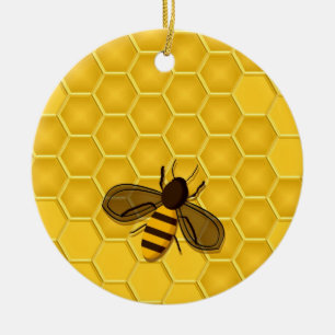 Ornamento de oro del panal con las abejas