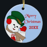 Ornamento de Waving Snowman Merry Christmas 20XX<br><div class="desc">Cambie el fondo azul claro detrás de este diseño a cualquier color que prefiera. Este muñeco de nieve es una imagen vintage que he coloreado/rediseñado completamente. He dejado el dorso del adorno en blanco en funda que quieres personalizar - de una familia o persona a otra, o un comentario personal,...</div>