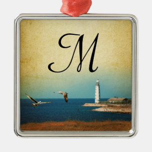 Ornamento inicial de la escena de playa del faro M