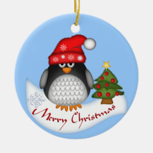 Ornamento lindo del navidad con el pingüino y el