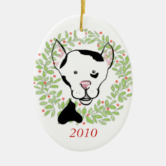 Ornamento manchado blanco y negro del perro