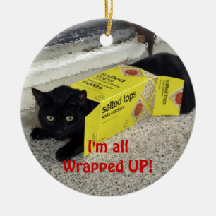 Ornamento navideño de felino juguetón